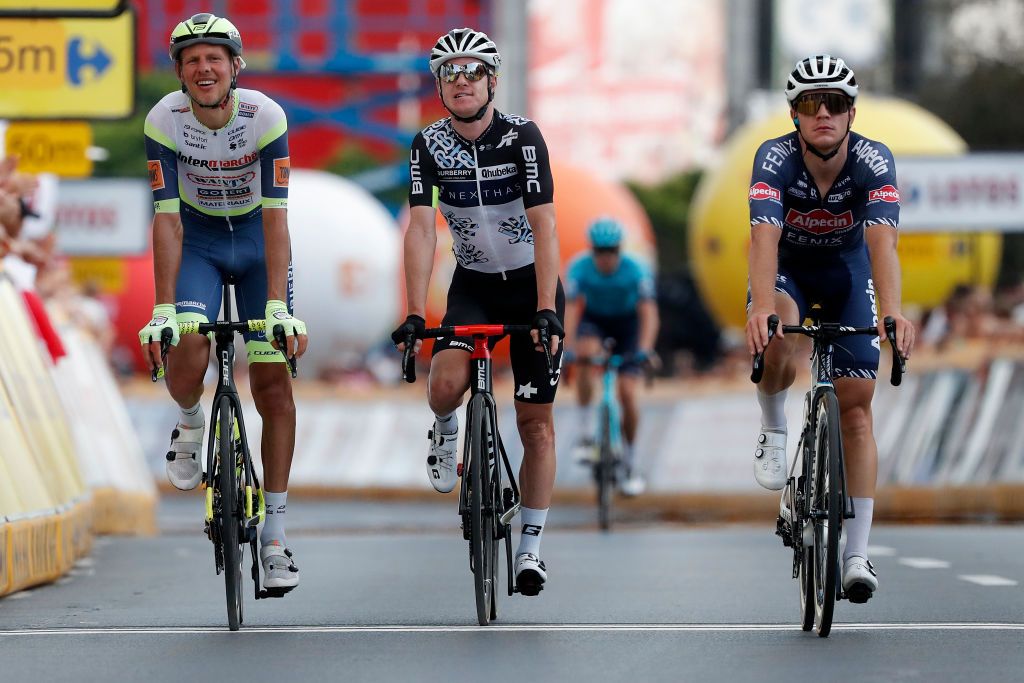 RZESZOW POLAND AUGUST 11 LR Taco Van Der Hoorn of The Netherlands and Team Intermarch Wanty Gobert Matriaux Simon Clarke of Australia and Team Qhubeka Nexthash Lionel Taminiaux of Belgium and Team AlpecinFenix at finish line during the 78th Tour de Pologne 2021 Stage 3 a 226km stage from Sanok to Rzeszw TourdePologne TDP2021 UCIWT on August 11 2021 in Rzeszow Poland Photo by Bas CzerwinskiGetty Images