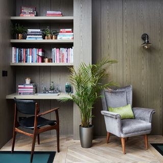 study room with wooden flooring and book shelves