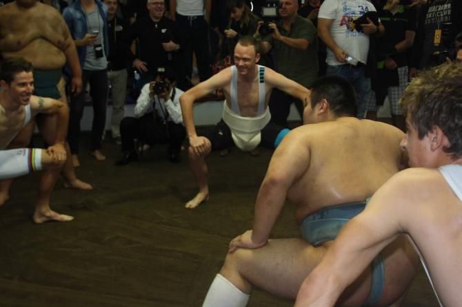 Chris Froome learns the poise of sumo.