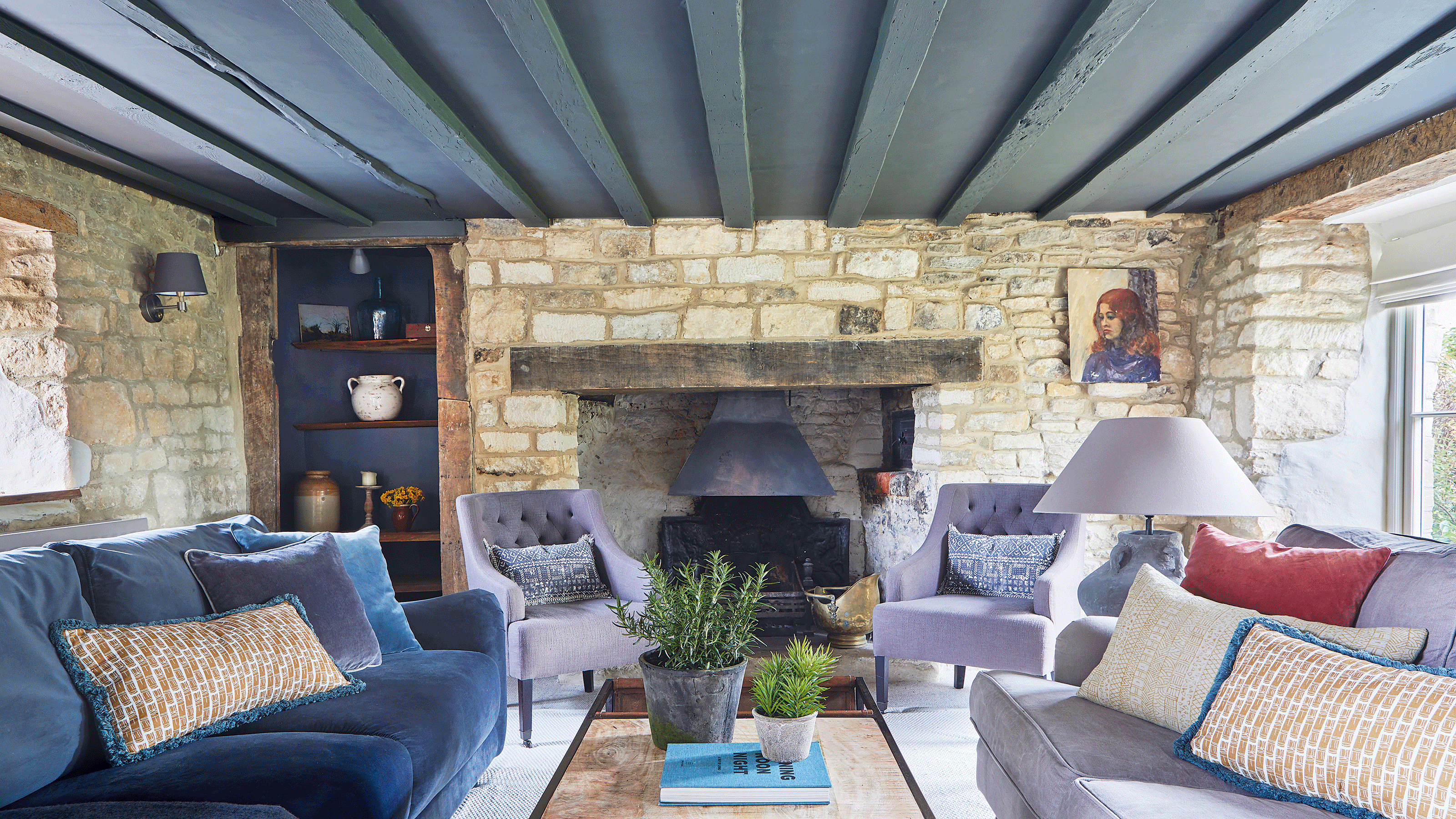 Cottage with stone walls and blue panelled ceiling