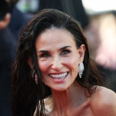 demi moore wears wet hair at a cannes film festival event