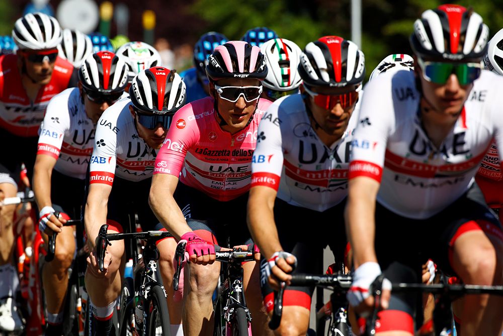 Overall leader Valerio Conti (UAE Team Emirates) sitting in the bunch surrounded by his teammates at the Giro d'Italia stage 11
