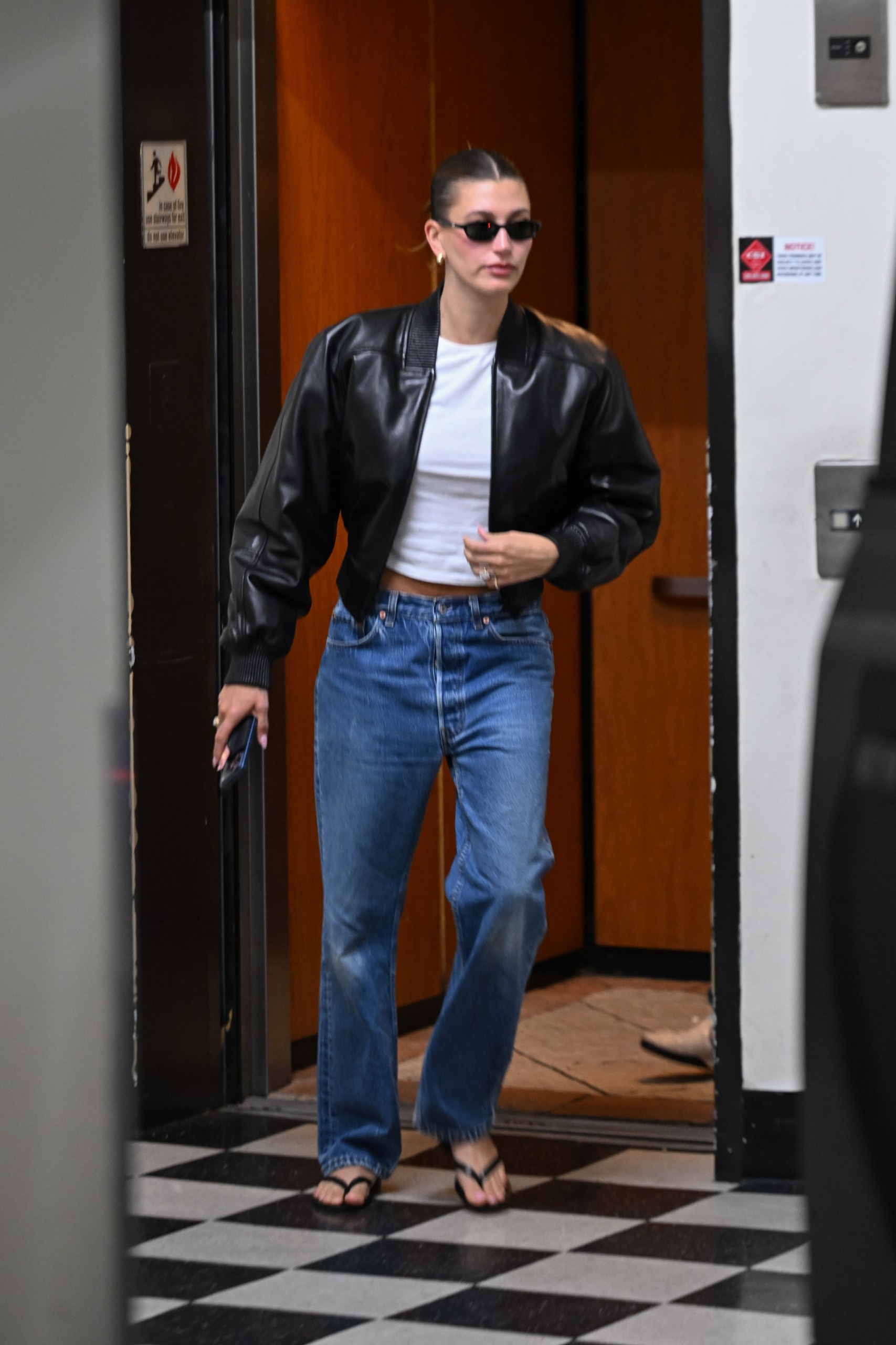 Hailey bieber leather jacket and jeans in 2025