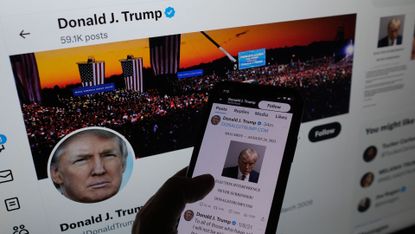 Trump posts mugshot on his Twitter / X account