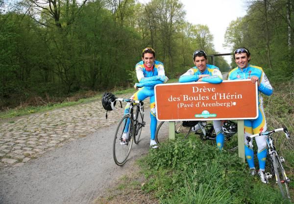 Alberto Contador and teammates Oscar Pereiro and Benjam&iacute;n Noval at the famed Forest of Arenberg - one of the sport's most dangerous stretches of "road".