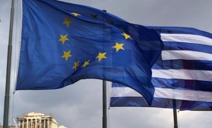 The EU and Greek flags fly in front of the Parthenon: EU leaders are at a stalemate over financial integration.