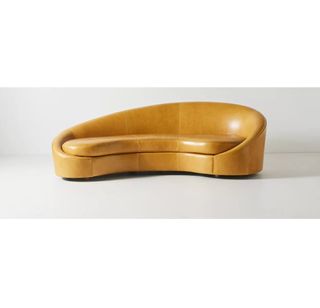 Retro '60s inspired curved leather sofa from Anthropologie. 