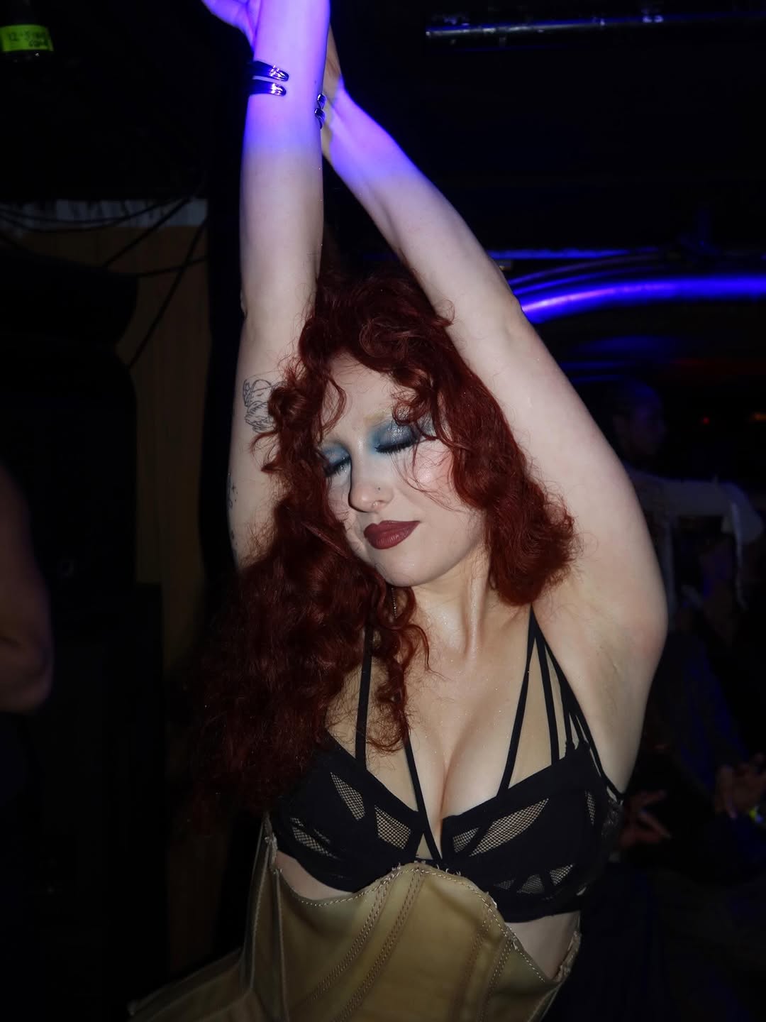 Chappell Roan wrapped Paris Fashion Week in a sheer bra, under-bust corset, and micro-shorts