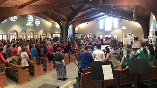 The congregation meets at Saint Gilbert Catholic Church.
