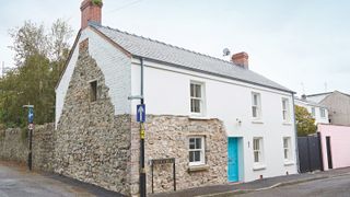 stone cottage renovated with white render
