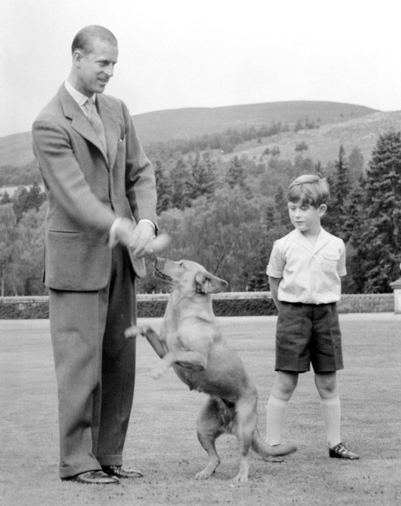 Photograph, People, Dog, Canidae, Standing, Carnivore, Ancient dog breeds, Dog breed, Family,
