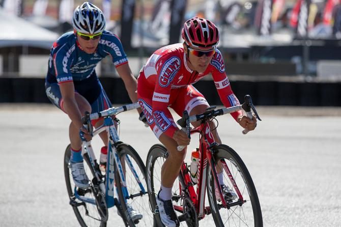 Stefano Barberi is closely marked by Michael Weicht with five laps to go in the pro men's race.
