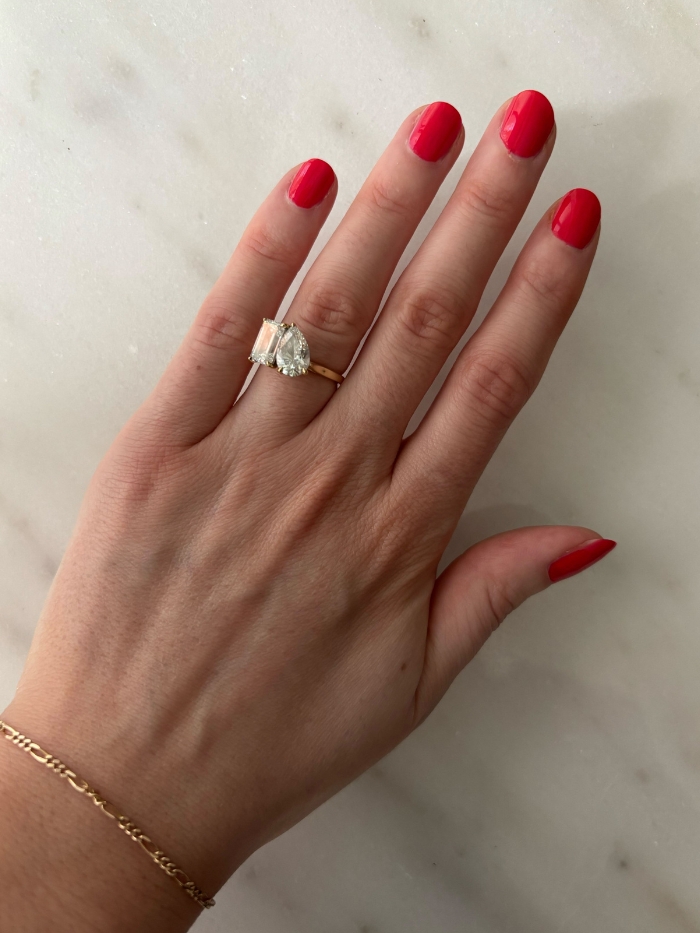 Deputy beauty editor Grace Lindsay testing OPI Cajun Shrimp