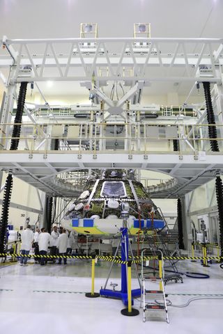 This image shows the installation of the Orion spacecraft's heat shield on July 25, 2018, at Kennedy Space Center in Florida.