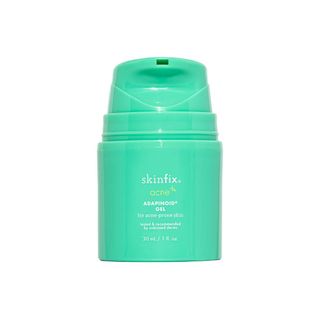 SKINFIX Acne Adapinoid Gel in a light green 30ml pump bottle.