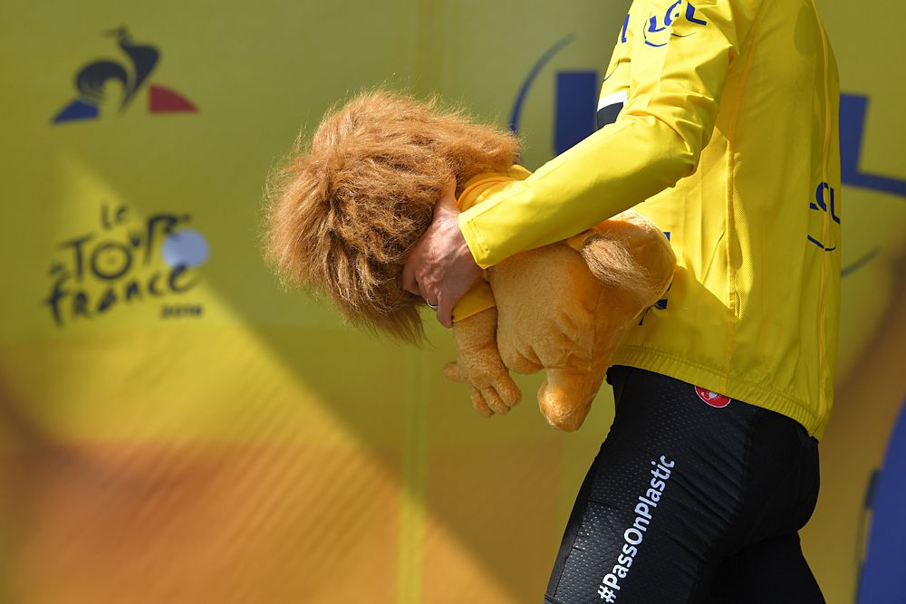 Geraint Thomas (Team Sky) walks off the podium after the stage 20 time trial