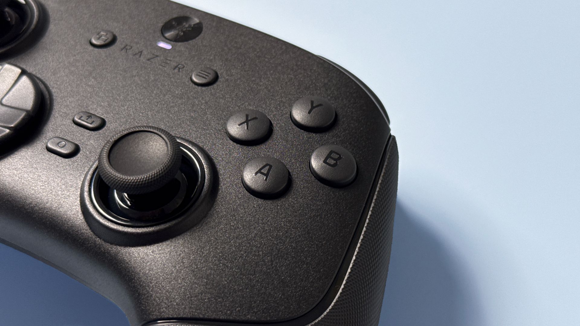 Razer Wolverine V3 Pro 8K Pro controller on a light blue background