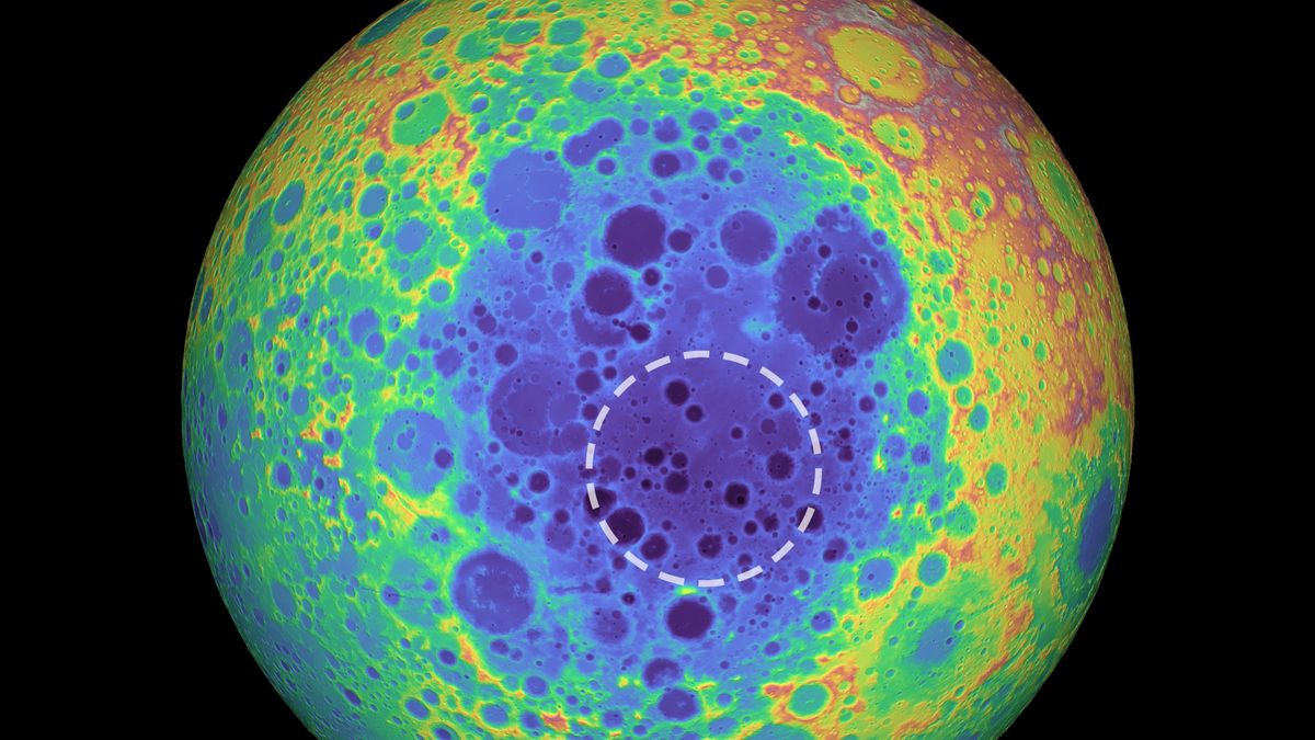 A topographical map of the far side of the moon shows the South Pole-Aitken basin in blue shades and the mass anomaly studied in the new research within the dashed line.