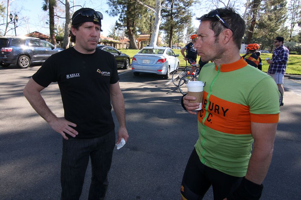 Directors Jonas Carney and Eric Wohlberg chat before the team ride.