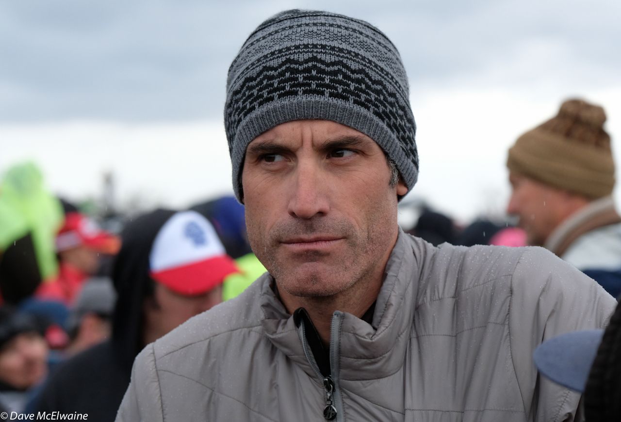 George Hincapie watching his teammate Lance Armstrong start the race.
