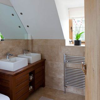 small en suite bathroom with twin basins