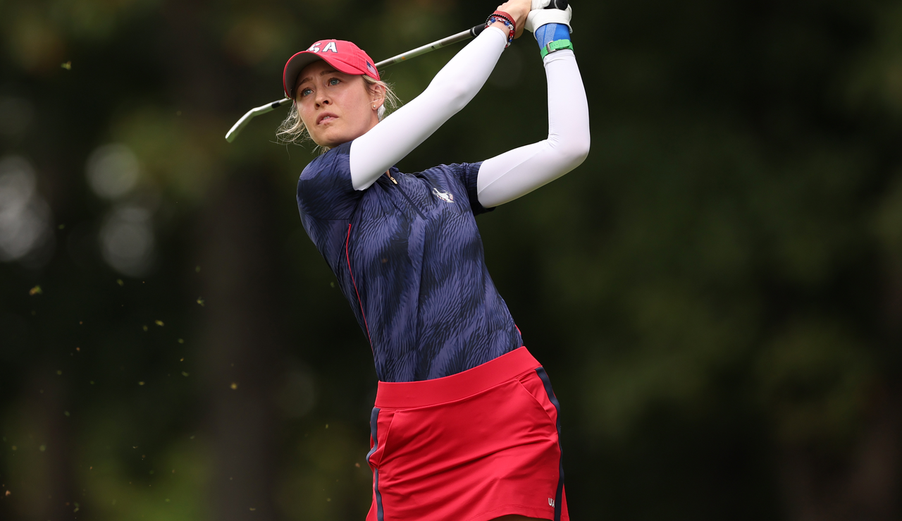 Nelly Korda strikes an iron shot from the fairway