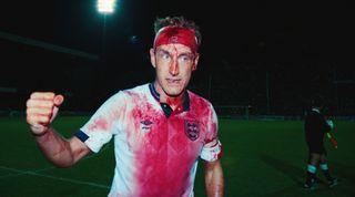 STOCKHOLM, SWEDEN - MAY 22: England's bloodied defender Terry Butcher celebrates after a goalless draw between Sweden and England in a 1990 FIFA World Cup Qualifiying match on September 6, 1989 in Stockholm, Sweden. (Photo by David Cannon/Allsport/Getty Images)