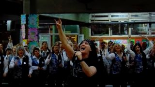 Dave Evans singing with a choir