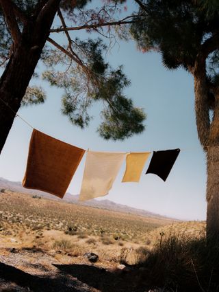 Baina x Estudio Persona Umbra towels on a washing line