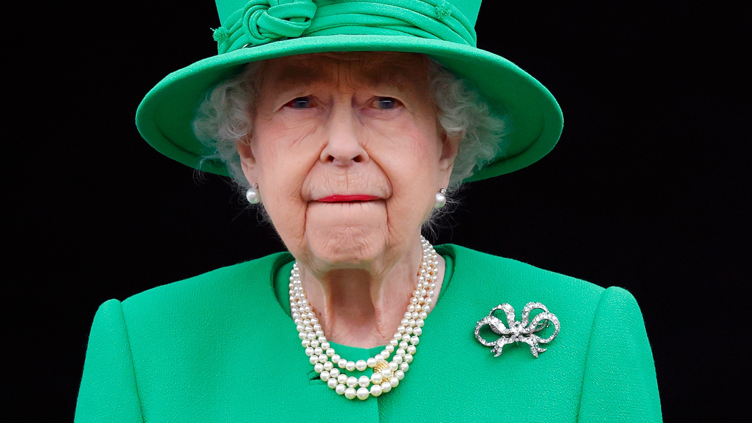 Queen Elizabeth II stands on the balcony of Buckingham Palace following the Platinum Pageant on June 5, 2022