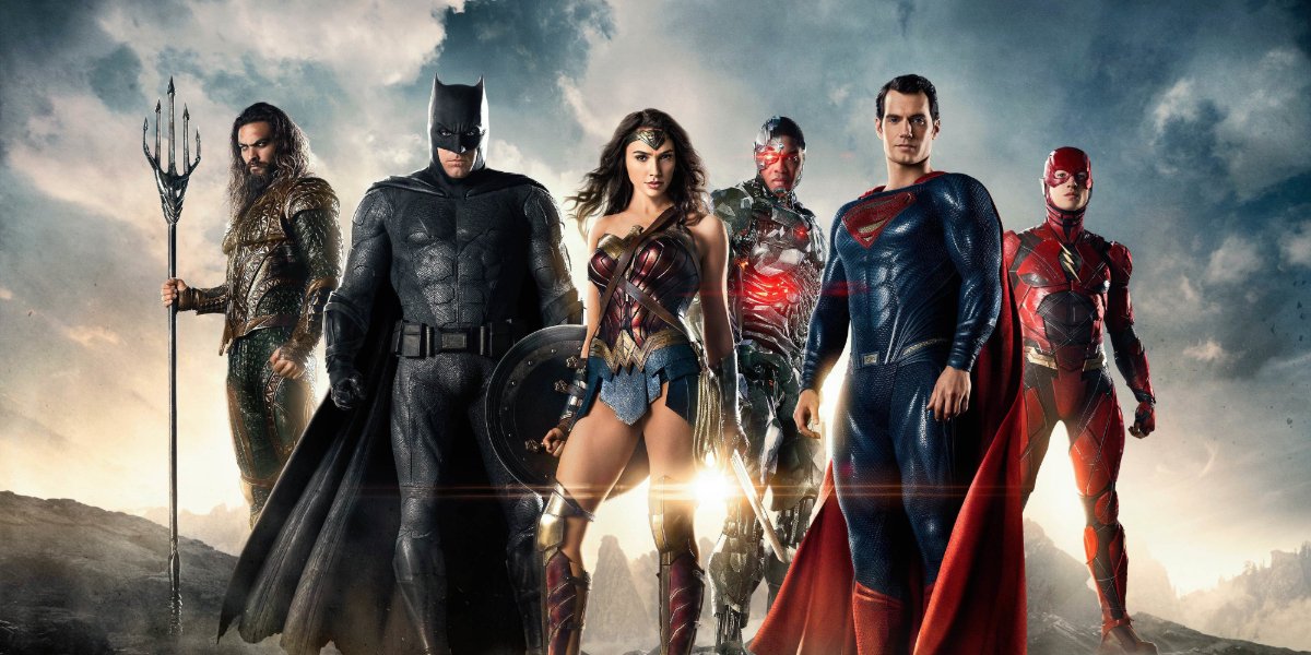 Justice League all six heroes lined up in front of the rising sun