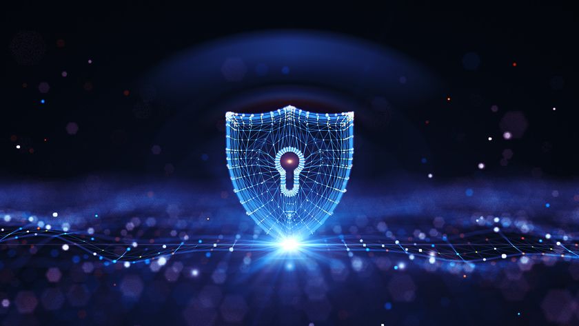 A glowing shield formed from glowing points and lines in an abstract landscape to represent security controls.