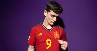 World Cup 2022: Why does Gavi wear No.9 for Spain? Gavi of Spain poses during the official FIFA World Cup Qatar 2022 portrait session on November 18, 2022 in Doha, Qatar