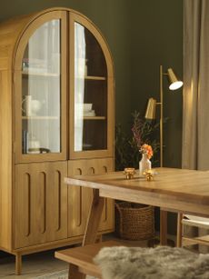 Oak Furnitureland table and glass-fronted dresser