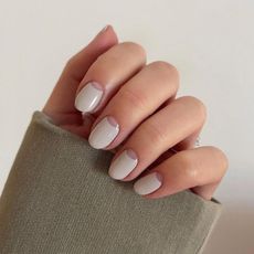 Half moon manicure in nude polish