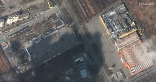 Maxar Technologies' WorldView-3 satellite captured this photo of a destroyed grocery store and shopping mall in Mariupol, Ukraine, on March 9, 2022.