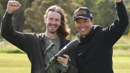 Two men with a custom-built drone