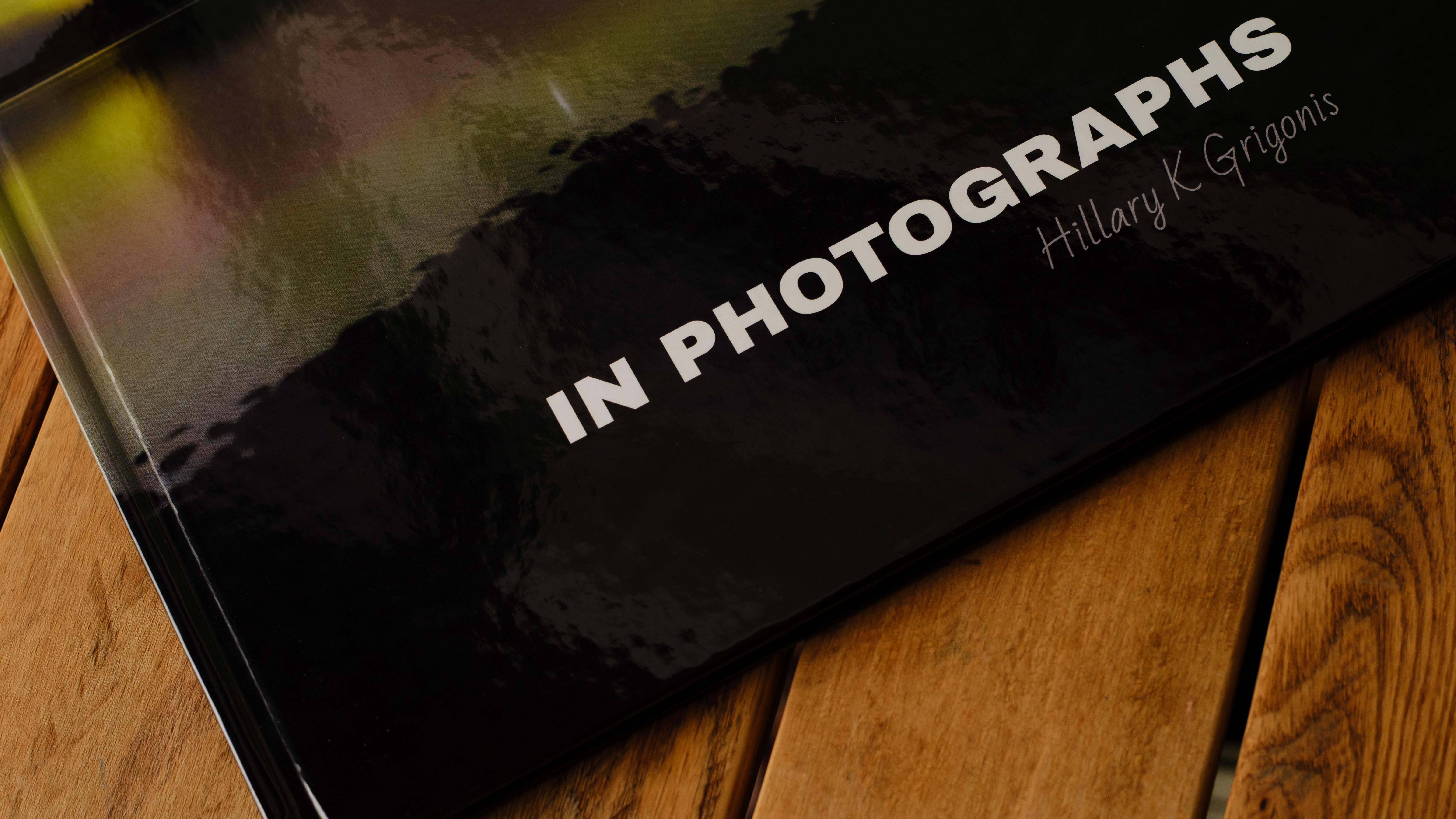 The Whitewall coffee table photo book on a desktop