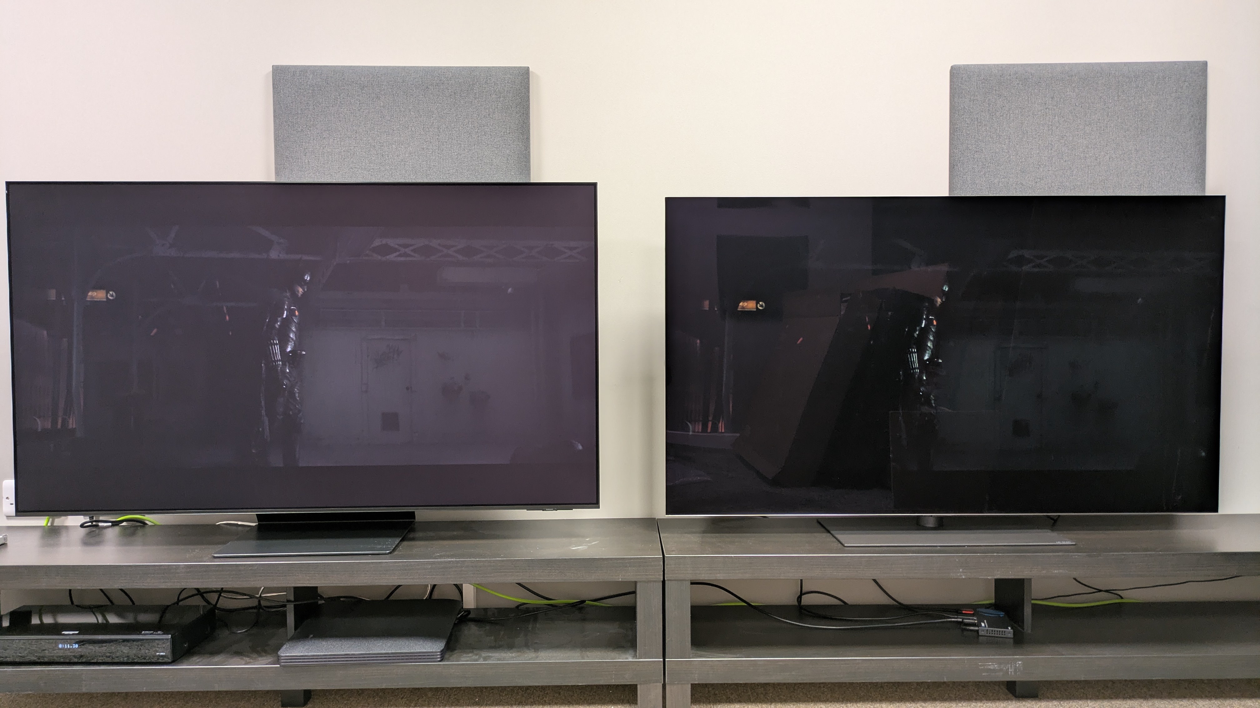 Samsung S95F (left) and LG G5 (right) displaying subway scene from The Batman, both TVs in Filmmaker mode with default settings