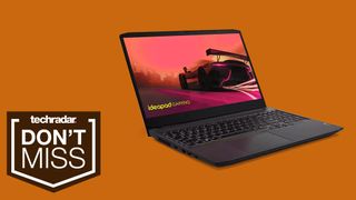 A Lenovo IdeaPad 3 gaming laptop against an orange background