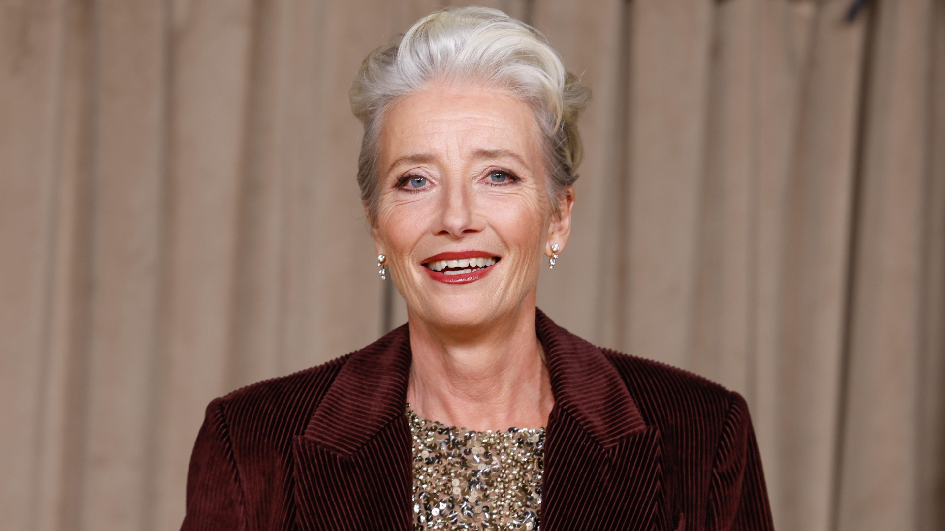 Emma Thompson poses for photographers upon arrival at The Albies