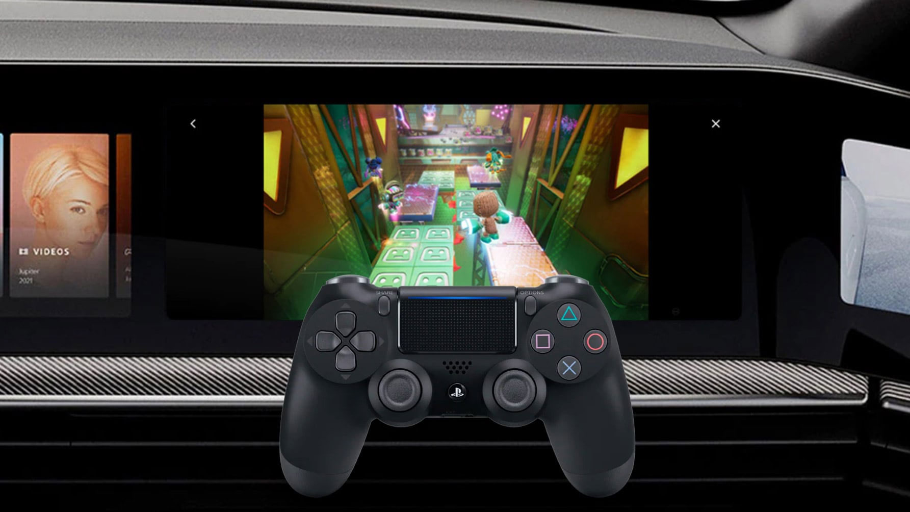 A PS5 DualSense control infront of the passenger display in the Sony Vision-S 02