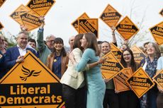 BRECON, UNITED KINGDOM - AUGUST 02: By-election victor and Welsh Lib Dem leader Jane Dodds MP (L) hugs Lib Dem leader Jo Swinson MP at a photocall to celebrate the victory in the Garden of th