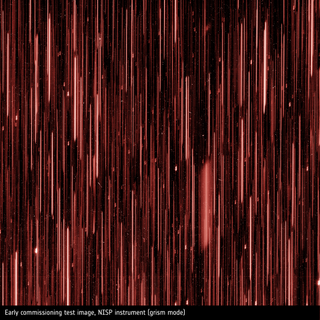 Red streaks against a dark background, an image taken by Euclid's NISP.