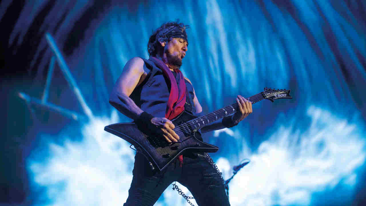 Iron Maiden&amp;rsquo;s Adrian Smith performing live onstage