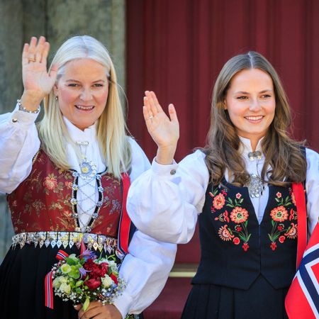 Princess Ingrid Alexandra and Crown Princess Mette-Marit waving