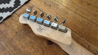 The back side of the Squier Paranormal Baritone Cabronita Telecaster headstock