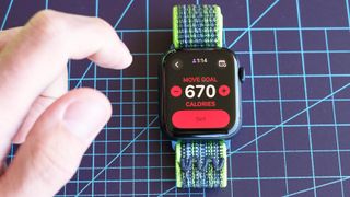 Close-up of the Apple Watch SE 2022 and Apple's Activity app where you can now pause Rings