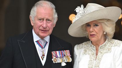 King Charles and Queen Camilla's pre-coronation photo explained. Seen here attending the National Service of Thanksgiving