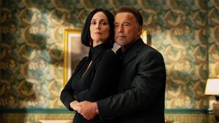 Carrie-Anne Moss as Greta Nelso and Arnold Schwarzenegger as Luke Brunner in "Fubar season 2"